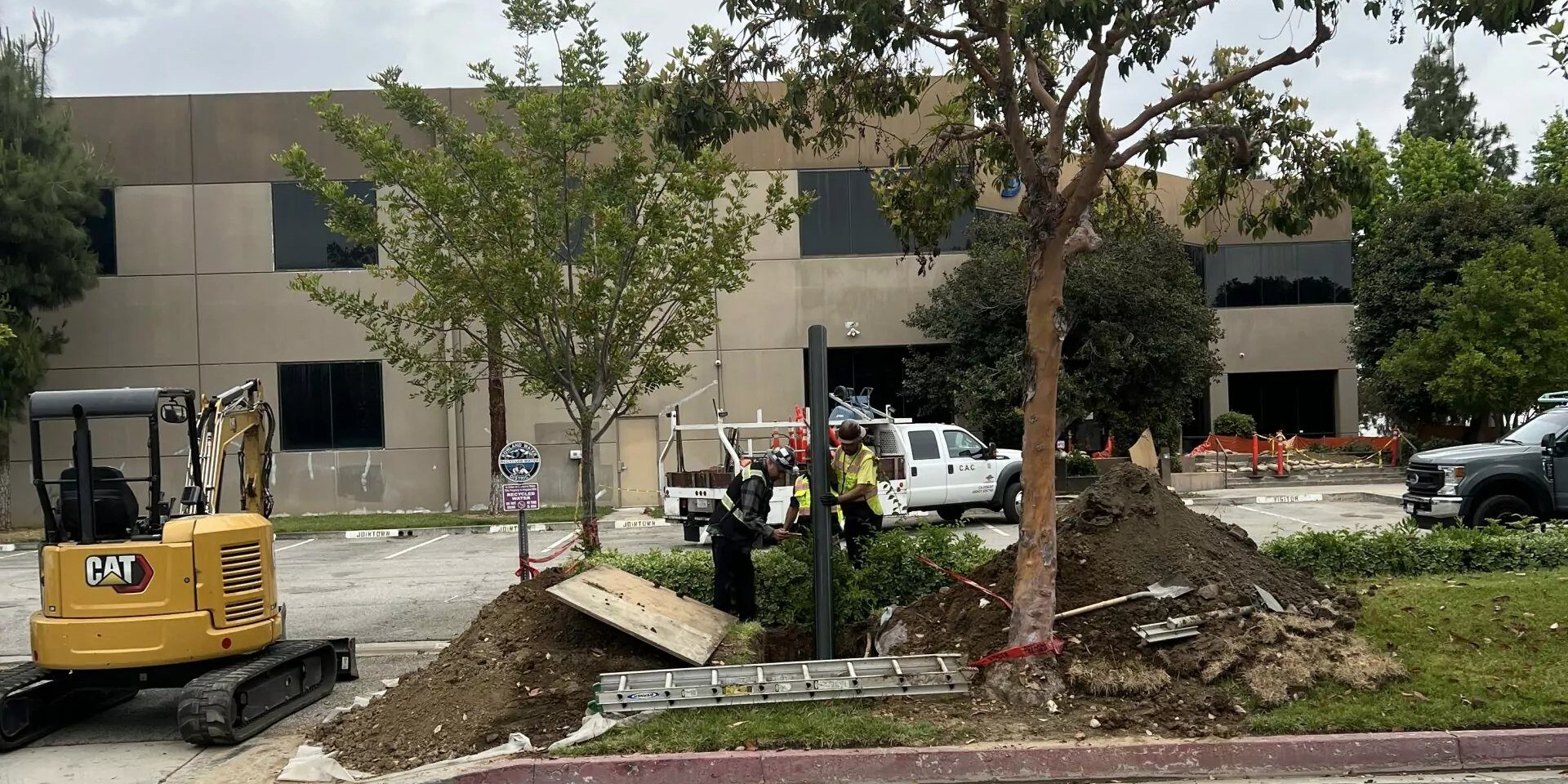 plumbers performing sewer repair